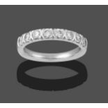 A Platinum Diamond Half Hoop Ring, eight round brilliant cut diamonds in claw settings, to a plain