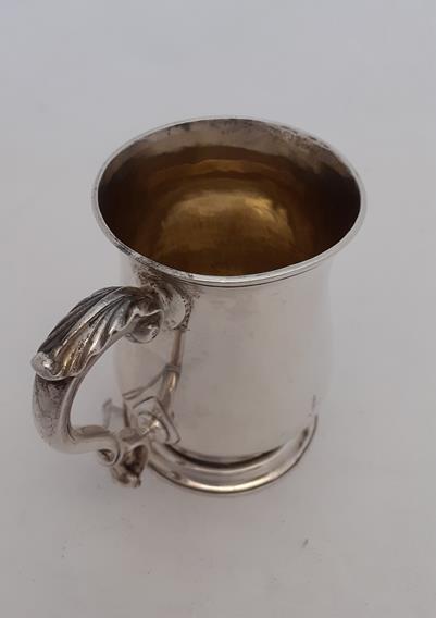 A George III Silver Mug, by William Cripps, London, 1762, baluster and on spreading foot, with - Image 2 of 5