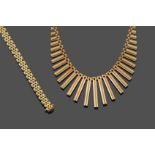 A 9 Carat Gold Fringe Necklace, the centre formed of yellow graduated fringe links to a brick link