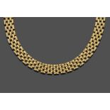 An 18 Carat Gold Fancy Link Chain, formed of yellow brick links, length 43cm see illustration .