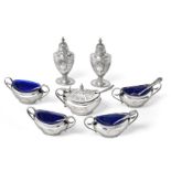 An Edward VII Silver Condiment-Set, by Walker and Hall, Sheffield, 1901, each piece part-fluted