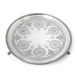 A Victorian Silver Salver, by Edward Ker Reid, London, 1871, circular and on three ball and claw