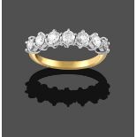 An 18 Carat Gold Diamond Seven Stone Ring, the round brilliant cut diamonds in white claw