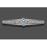 An Aquamarine and Diamond Bar Brooch, two round brilliant cut aquamarines centre a bar with old