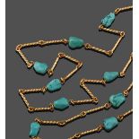 A Turquoise Fancy Link Chain, three yellow rope baton links inter-spaced by a turquoise matrix bead,