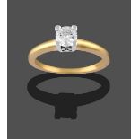 An 18 Carat Gold Diamond Solitaire Ring, the round brilliant cut diamond in a white square four claw