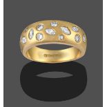 An 18 Carat Gold Diamond Ring, the marquise and round brilliant cut diamonds in random