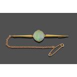 An Opal Bar Brooch, the round cabochon opal in a yellow double claw setting, to a tapering bar,
