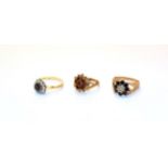 An 18 carat gold sapphire and diamond cluster ring, finger size M, a 9 carat gold sapphire and