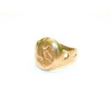 A signet ring, depicting a greyhound (misshapen) . Unmarked. Gross weight 10.7 grams.