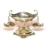 A silver plate centrepiece epergne, late 19th/early 20th century, on oval base with openwork foliage