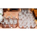 Waterford crystal tumblers of various sizes, and other drinking glasses (on two trays)