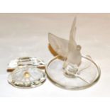 A Lalique pin tray, modelled as a rising bird and a Swarovski crystal oyster shell (2)