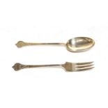 A George V silver serving spoon and fork, by Thomas Bradbury, Sheffield, 1933, Trefid pattern with