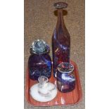 Five pieces of Mdina glass, in brown, amber and white, including vases, a bottle and stopper, two