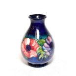 A Moorcroft vase, 24cm high