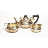 A three-piece George V silver tea service, by Herbert Edward Barker & Frank Ernest Barker,