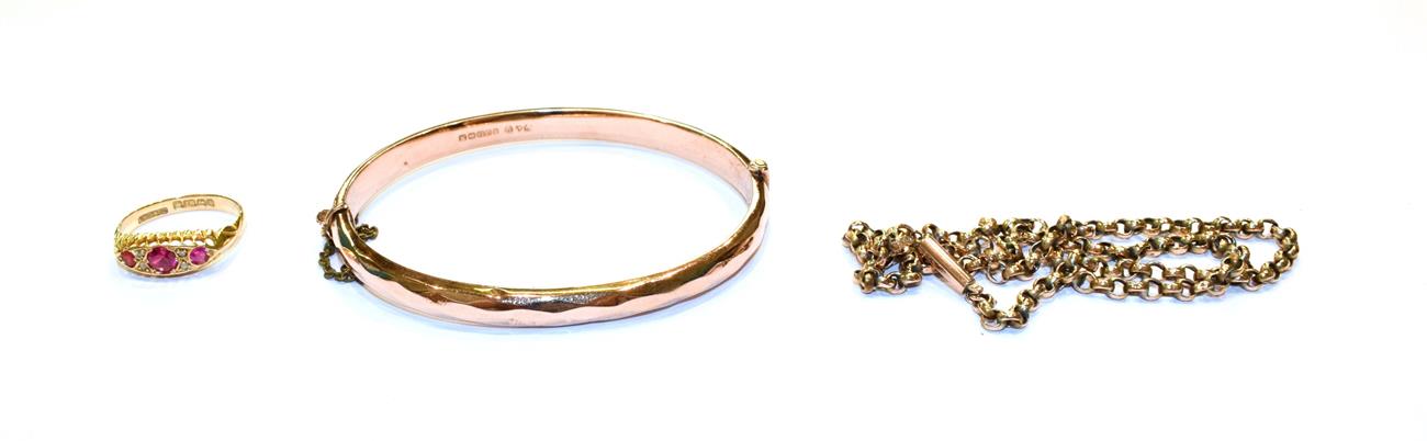 A 9 carat gold bangle, a trace link chain stamped '9CT', length 41cm and an 18 carat gold