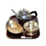 Three silver items, comprising: a silver teapot, with ebonised wood handle; a navette-shaped dish