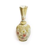 A Grainger vase, with reticulated shoulder and rim, the sides painted with red, yellow and white