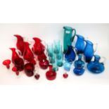 Whitefriars - A Group of Glass Jugs, Candlesticks and Mugs, in ruby, blue and green, various pattern