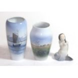 Two Copenhagen vases and a Copenhagen mermaid figure, 12cm high (3)