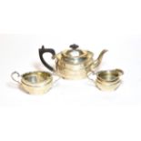 A three-piece George V silver tea-service, by David Landsborough Fullerton, London, 1919, each piece