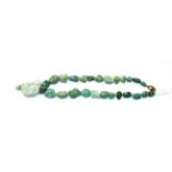 A turquoise matrix bead necklace, length 44cm . Clasp stamped '375'. Gross weight 96.8 grams.