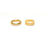 Two 22 carat gold band rings, finger sizes J and L. Gross weight 11.0 grams