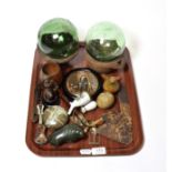 An interesting group lot including earthenware bowls, glass floats, a small bronze figure of a