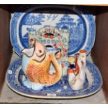 Two 19th century blue and white meat plates, two Staffordshire figures, one as a watch holder the