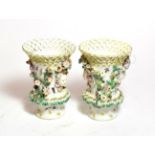 A pair of Derby basket vases with butterflies and insects, circa 1765 (2). 17cm high