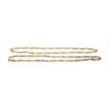 Two figaro link necklaces, stamped '375', lengths 50.5cm and 52cm. Gross weight 22.43 grams