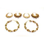Three pairs of 9 carat gold hoop earrings, various designs . Gross weight 10.66 grams.