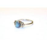 An opal and diamond ring, stamped '18CT', finger size O1/2. Gross weight 3.1 grams