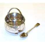 A Russian silver bowl and an associated Russian silver spoon, the bowl tapering and on three ball
