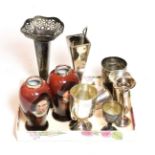 A collection of assorted silver vases and cups, including a pair of silver-mounted ceramic vases,
