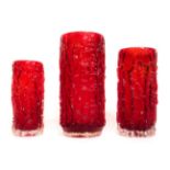 Whitefriars - Geoffrey Baxter: A Trio of Textured Range Cylindrical Bark Glass Vases, in ruby,