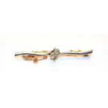 A diamond bar brooch, stamped '15CT', length 4.9cm. Gross weight 3.4 grams.