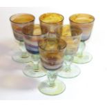 Michael Harris for Mdina: Six Goblets, in purple and brown, clear knop, each signed Michael Harris