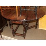 An early 18th century oak dining table with single frieze drawer, 130cm wide by 150cm extended by