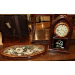 A Victorian glazed wood tray, shaped oval and on bun feet, the glazed panel over a flower and