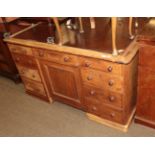A late Victorian stained pine partners desk