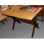 An X-Frame pine tavern table, 120cm wide by 78cm deep by 78cm high