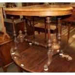 A Victorian walnut oval table