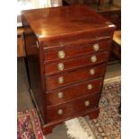 A five-drawer straight fronted chest