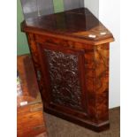 A Victorian walnut standing corner cupboard