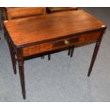 A Victorian mahogany fold over tea table, with a single drawer, 96cm wide by 46.5cm by 75cm high