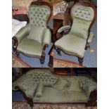 A three-piece Victorian mahogany frame suite recovered in buttoned green fabric comprising a
