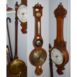 An oak cased aneroid barometer retailed by F. Richardson, Stockton on Tees, a 19th century